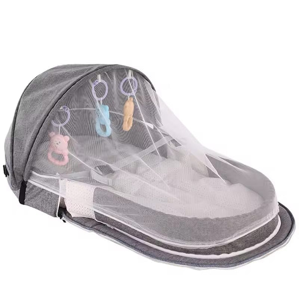 Portable Baby Bassinet – Foldable Travel Bed with Mosquito Net & Toys